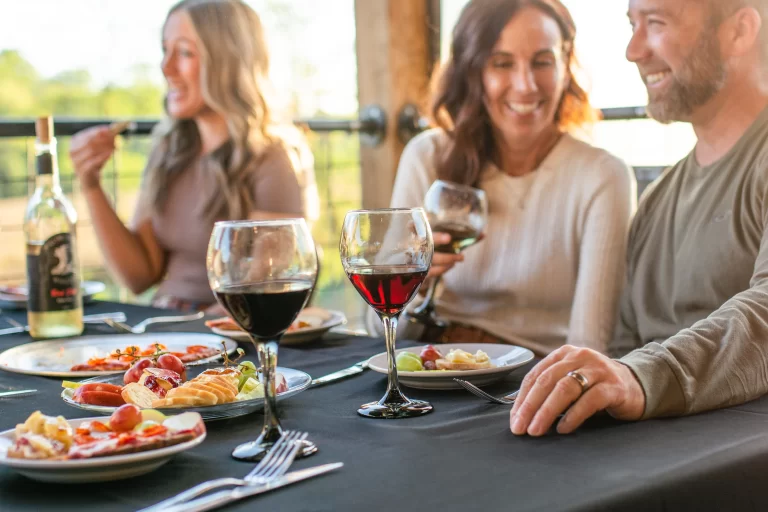 Outside couple with wine 768x512